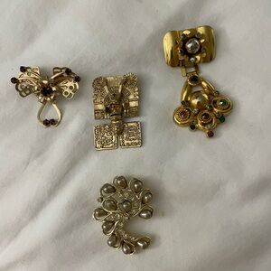 4 vintage pins. 3 with stones.